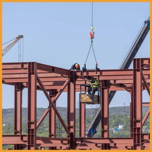 Metal building frame installation in progress in Carmel