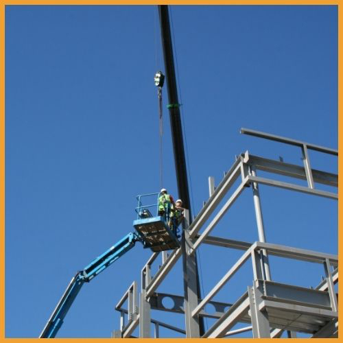 Metal building installation in progress on Noblesville jobsite