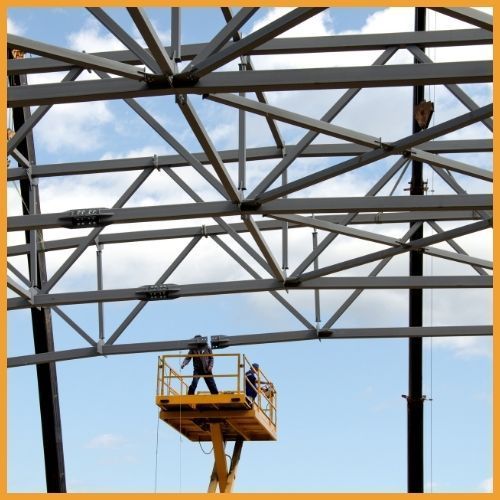 Steel erection professionals assembling structural beams in Greenwood, IN