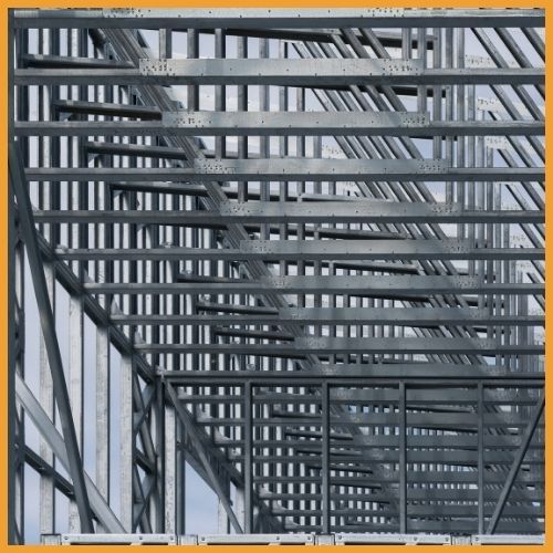 Steel erection professionals working on a jobsite in Plainfield, IN